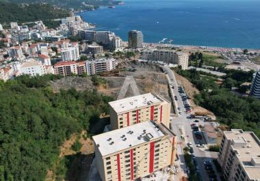 Atemberaubende 48 m2 große Wohnung mit 2 Schlafzimmern und Meerblick in Becici im Neubau